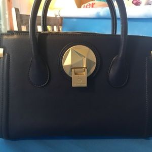 Navy blue with gold accent Celine Dion purse.